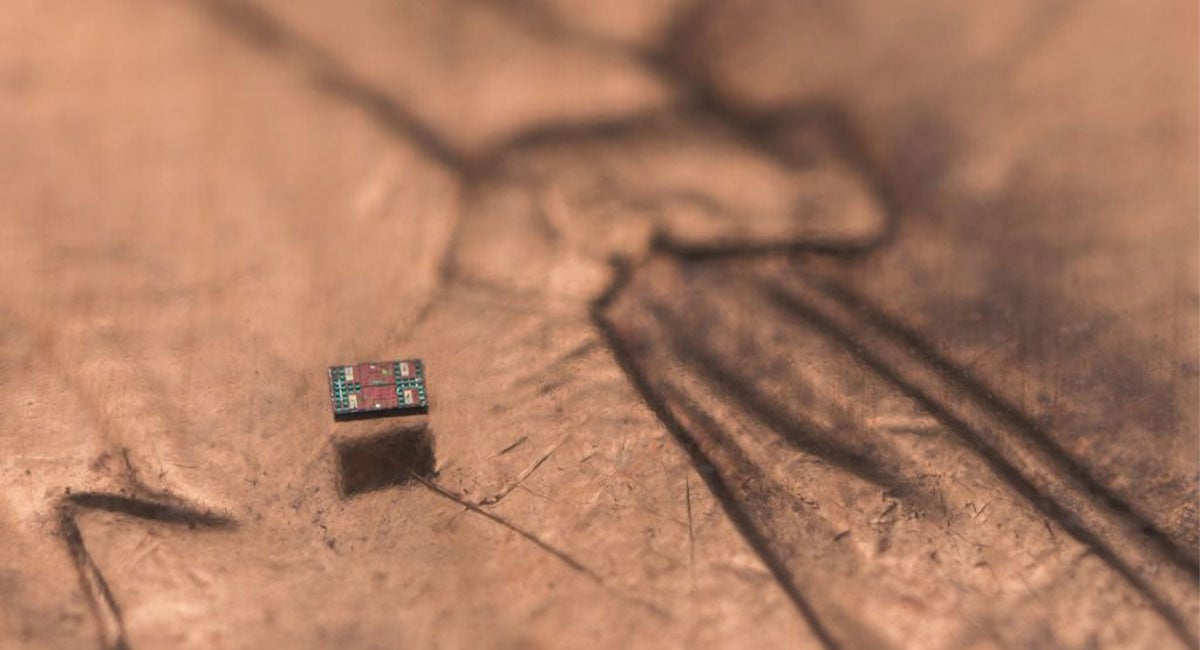 credited to Michael Simari, of the University of Michigan, and depicts a microrobot on a U.S. penny, showing scale.